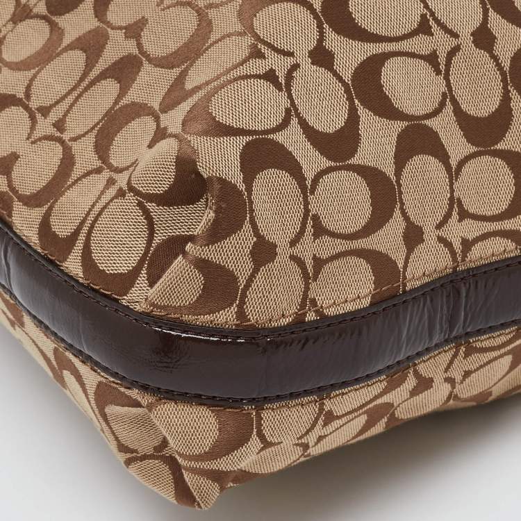 Pre Owned Coach Beige/Brown Signature Canvas and Leather Hobo