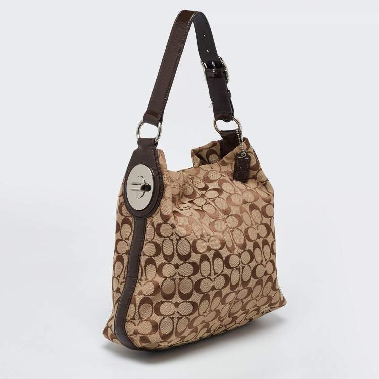 Pre Owned Coach Beige/Brown Signature Canvas and Leather Hobo