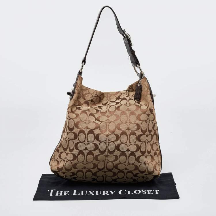 Pre Owned Coach Beige/Brown Signature Canvas and Leather Hobo