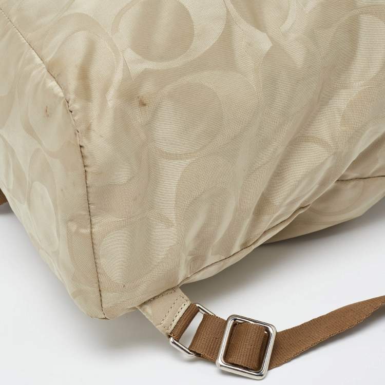 Pre Owned Coach Beige/Metallic Signature Nylon and Leather Backpack