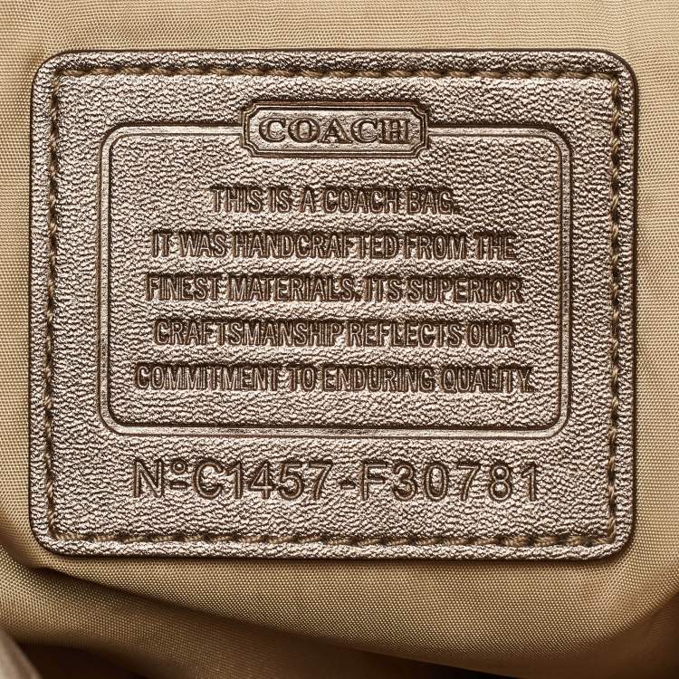 Pre Owned Coach Beige/Metallic Signature Nylon and Leather Backpack