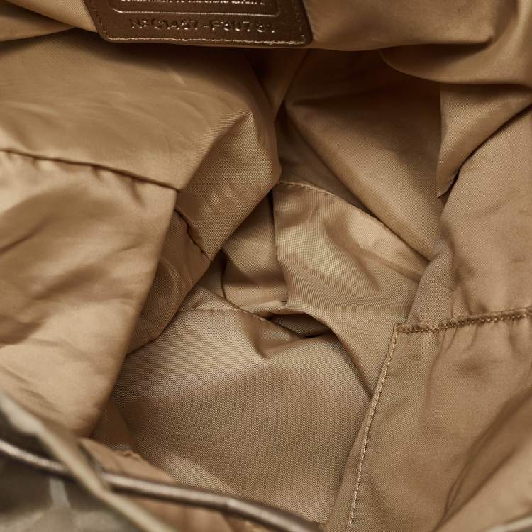 Pre Owned Coach Beige/Metallic Signature Nylon and Leather Backpack