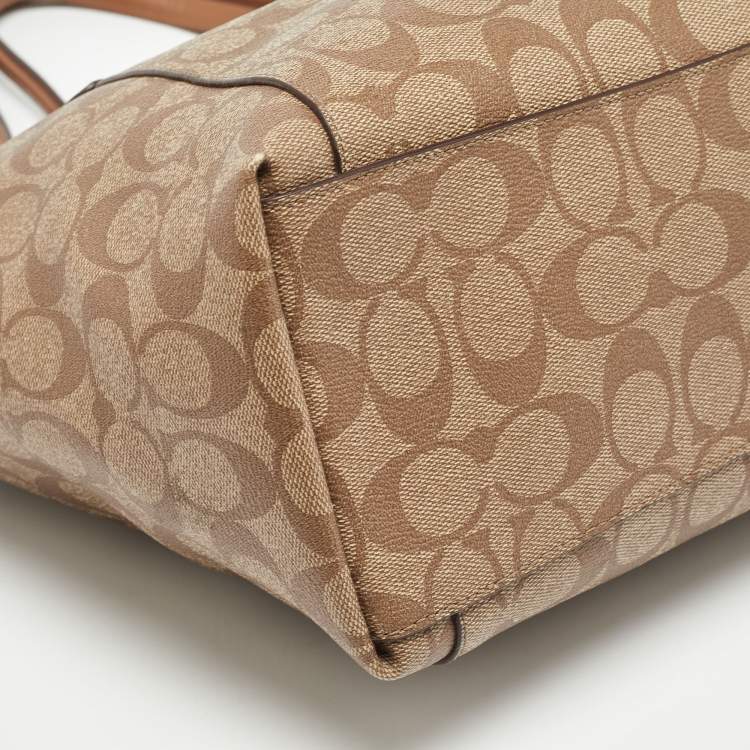 Pre Owned Coach Brown/Beige Signature Coated Canvas and Leather Ava Tote