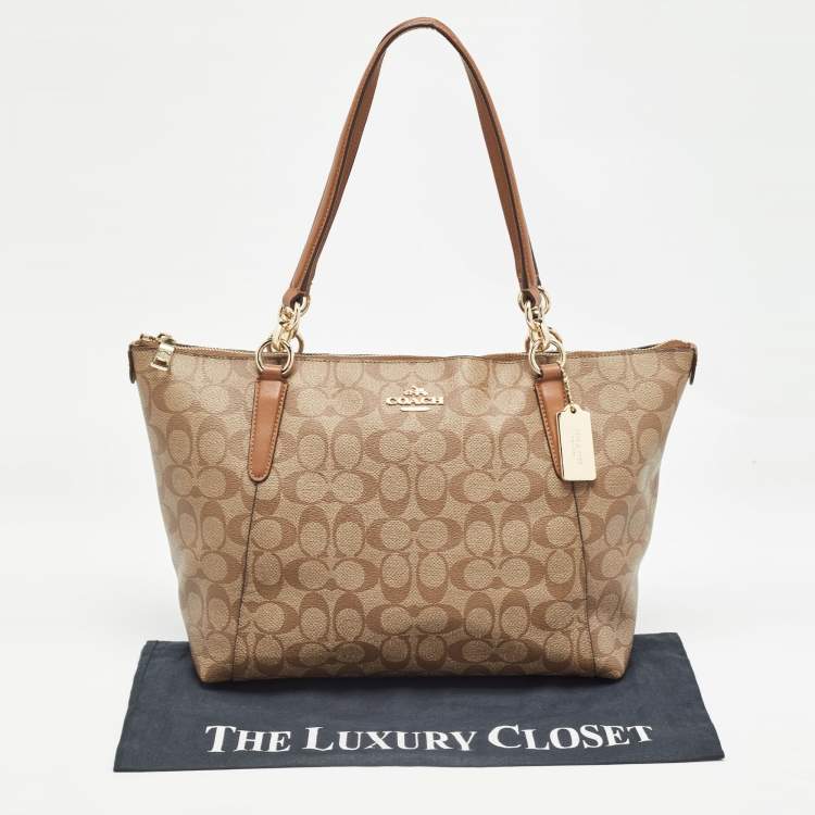Pre Owned Coach Brown/Beige Signature Coated Canvas and Leather Ava Tote