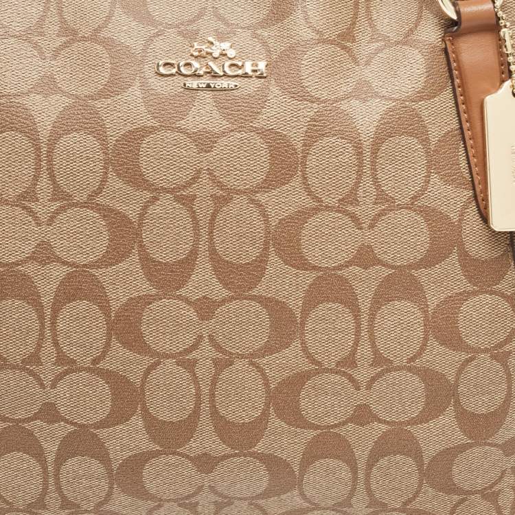Pre Owned Coach Brown/Beige Signature Coated Canvas and Leather Ava Tote