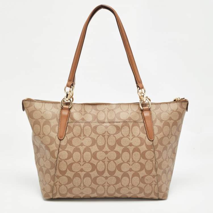 Pre Owned Coach Brown/Beige Signature Coated Canvas and Leather Ava Tote
