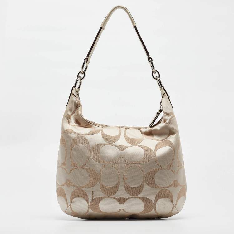 Pre Owned Coach Beige Signature Fabric Kristine Hobo