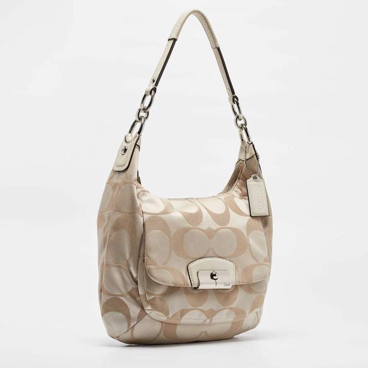 Pre Owned Coach Beige Signature Fabric Kristine Hobo