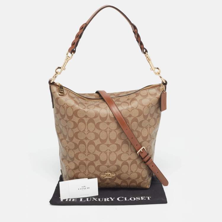 Pre Owned Coach Brown/Beige Signature Coated Canvas Abby Duffle Shoulder Bag