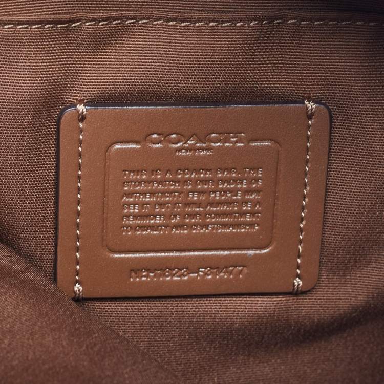 Pre Owned Coach Brown/Beige Signature Coated Canvas Abby Duffle Shoulder Bag