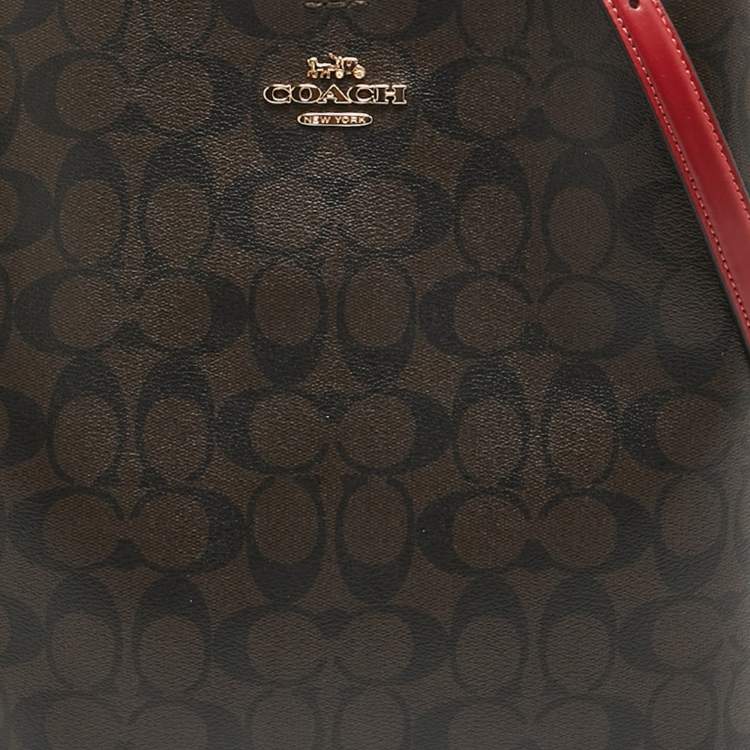 Pre Owned Coach Brown/Red Signature Coated Canvas and Leather Mollie Bucket Bag