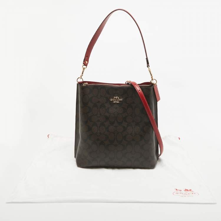 Pre Owned Coach Brown/Red Signature Coated Canvas and Leather Mollie Bucket Bag