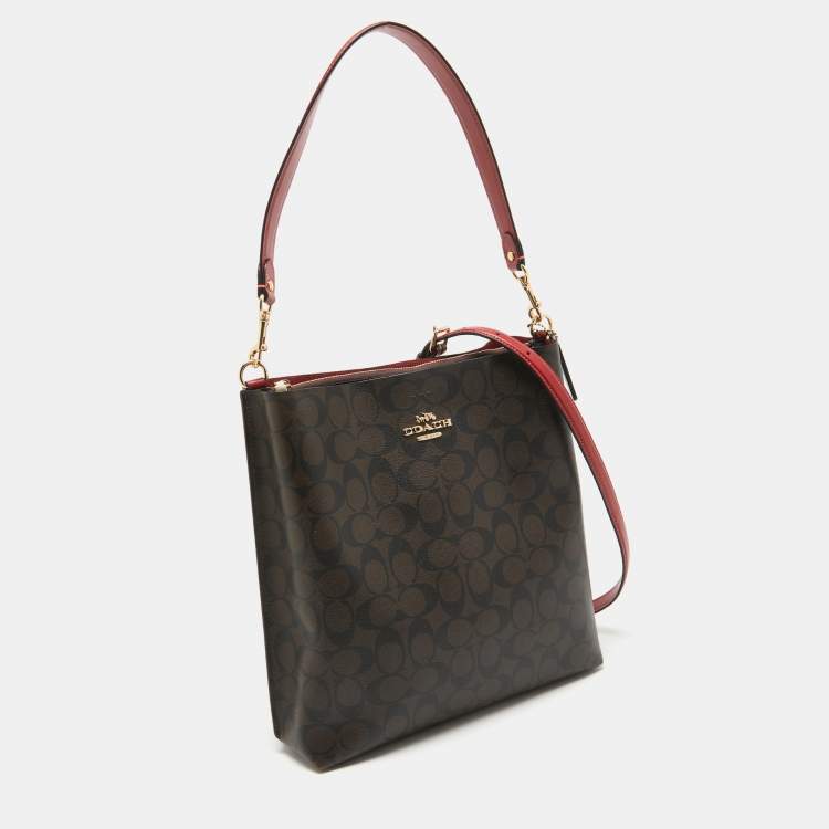 Pre Owned Coach Brown/Red Signature Coated Canvas and Leather Mollie Bucket Bag