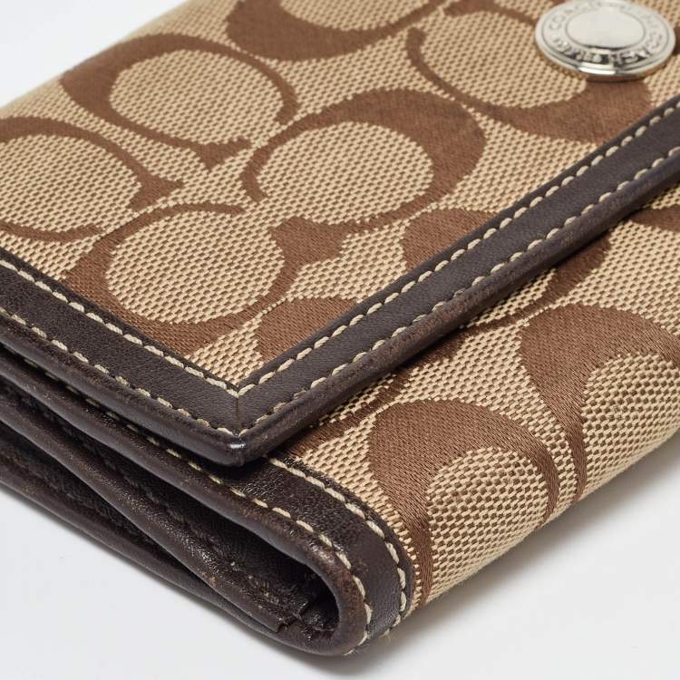 Pre Owned Coach Beige/Brown Signature Canvas and Leather Continental Wallet