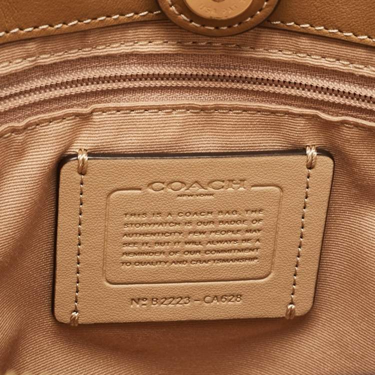 مملوكة مسبقًا Coach Beige/Off White Signature Coated Canvas and Leather Lillie Carryall Satchel