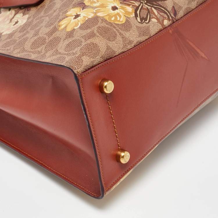 Pre Owned Coach Brown Prairie Floral Signature Coated Canvas and Leather Charlie Carryall Tote