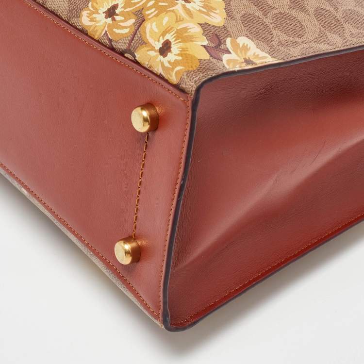 Pre Owned Coach Brown Prairie Floral Signature Coated Canvas and Leather Charlie Carryall Tote