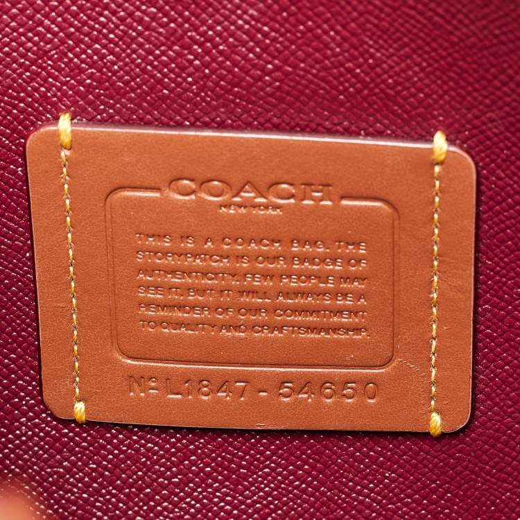 Pre Owned Coach Brown Prairie Floral Signature Coated Canvas and Leather Charlie Carryall Tote