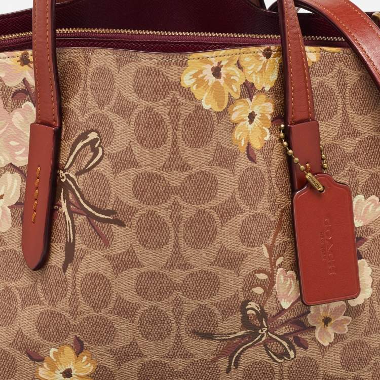 Pre Owned Coach Brown Prairie Floral Signature Coated Canvas and Leather Charlie Carryall Tote