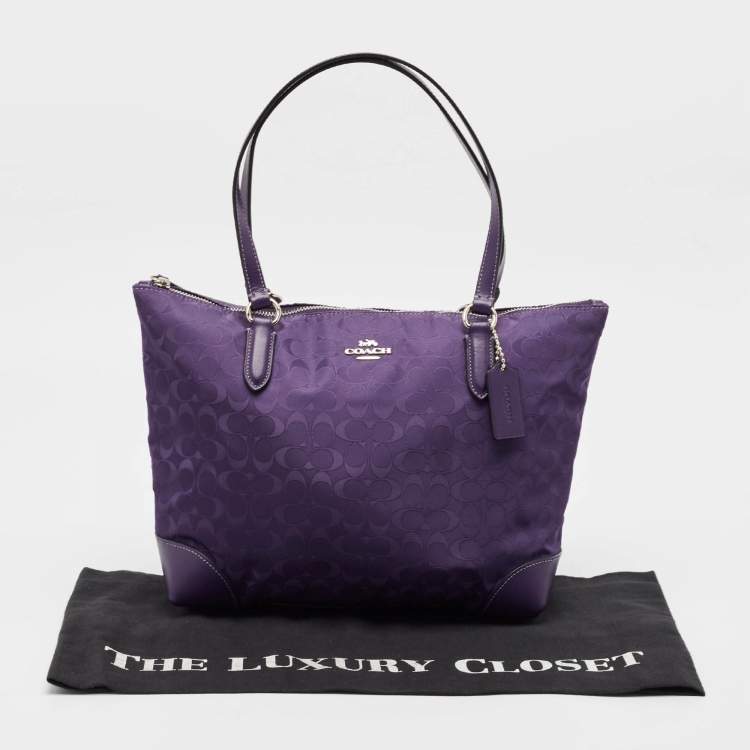 Pre Owned Coach Purple Signature Nylon and Leather Zip Top Tote