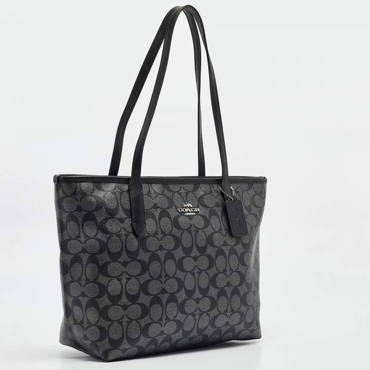 Pre Owned Coach Black/Silver Signature Coated Canvas and Leather City Zip Tote