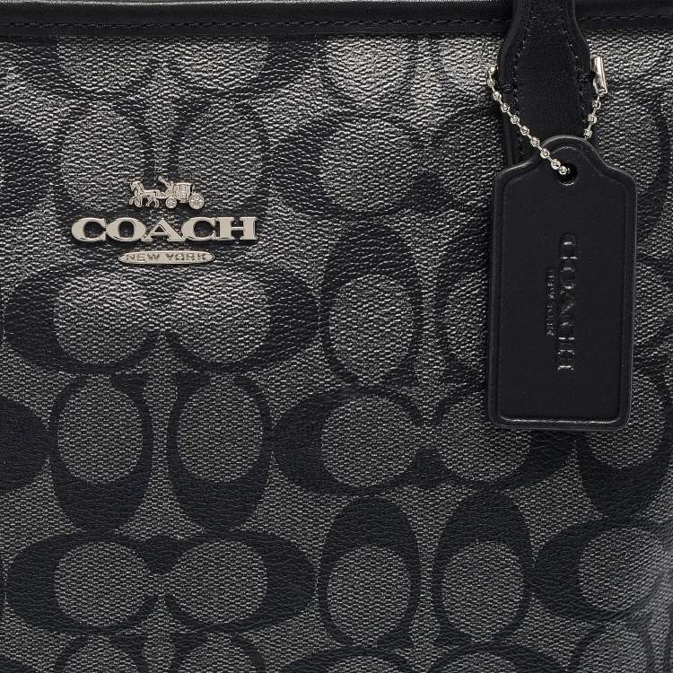 Pre Owned Coach Black/Silver Signature Coated Canvas and Leather City Zip Tote