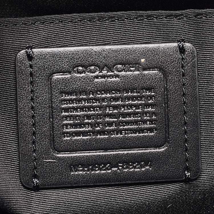 Pre Owned Coach Black/Silver Signature Coated Canvas and Leather City Zip Tote
