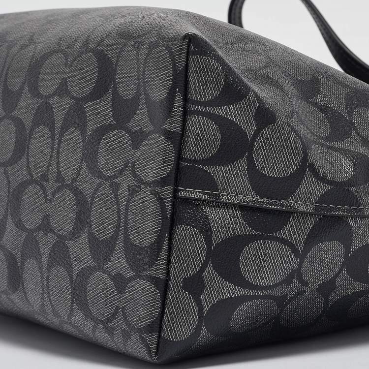 Pre Owned Coach Black/Silver Signature Coated Canvas and Leather City Zip Tote