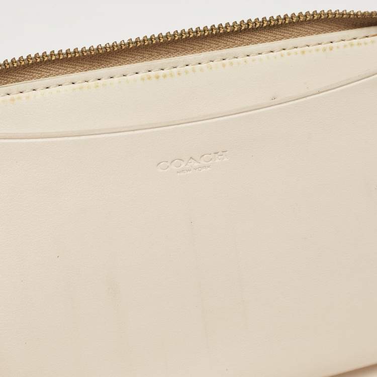 Pre Owned Coach Beige Siganture Coated Canvas and Leather Zip Around Wristlet Wallet