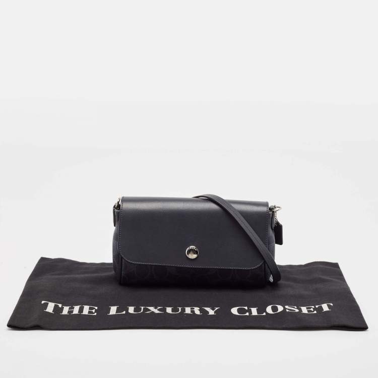 Pre Owned Coach Navy Blue Signature Coated Canvas and Leather Reversible Flap Crossbody Bag