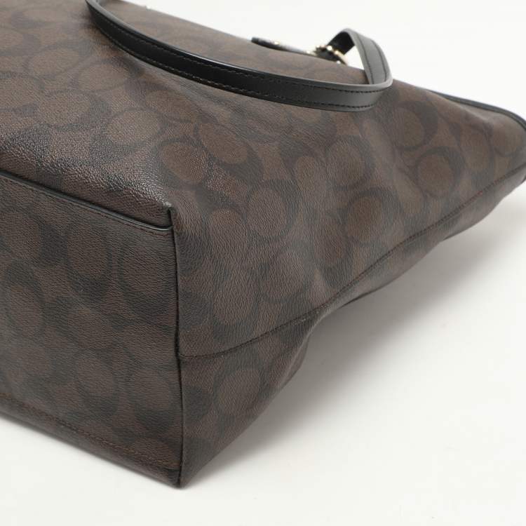 Pre Owned Coach Black/Brown Signature Coated Canvas and Leather City Zip Tote