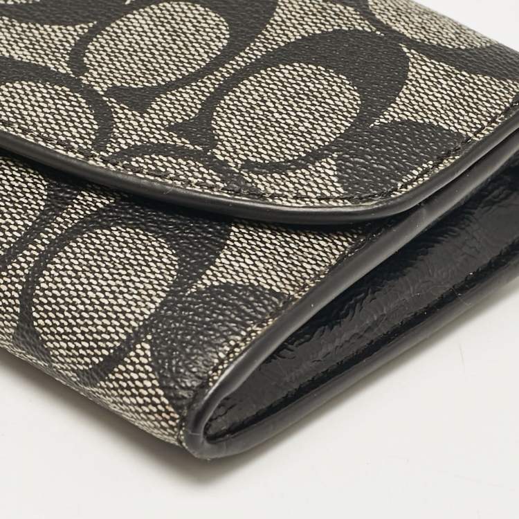 Pre Owned Coach Black Signature Coated Canvas Peyton Continental Wallet