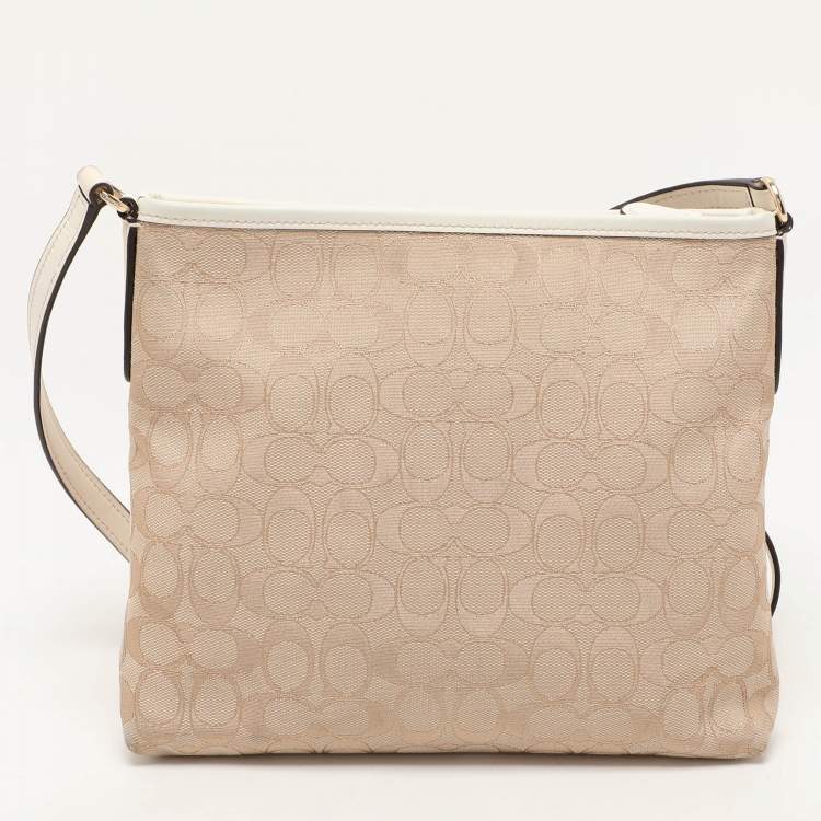 Pre Owned Coach Beige/White Signature Canvas and Leather Swingpack File Crossbody Bag