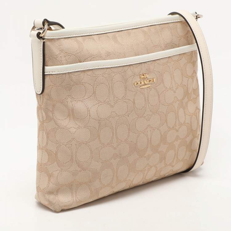 Pre Owned Coach Beige/White Signature Canvas and Leather Swingpack File Crossbody Bag