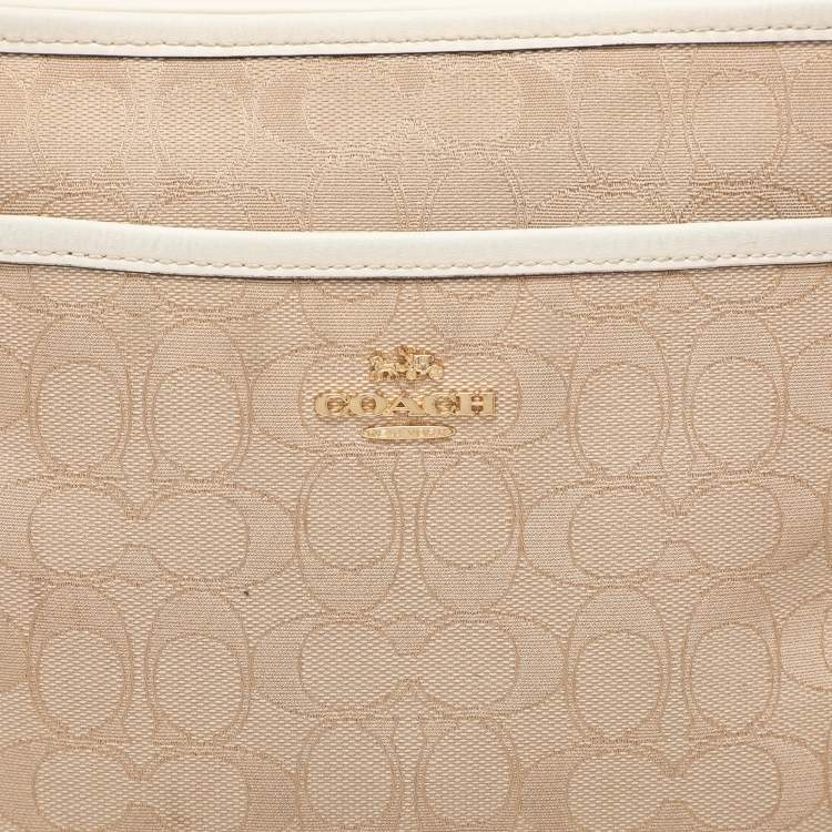 Pre Owned Coach Beige/White Signature Canvas and Leather Swingpack File Crossbody Bag