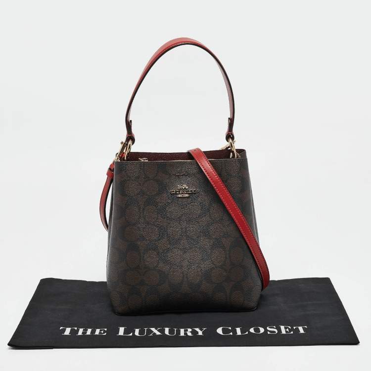 Pre Owned Coach Red/Brown Signature Coated Canvas and Leather Small Town Bucket Bag