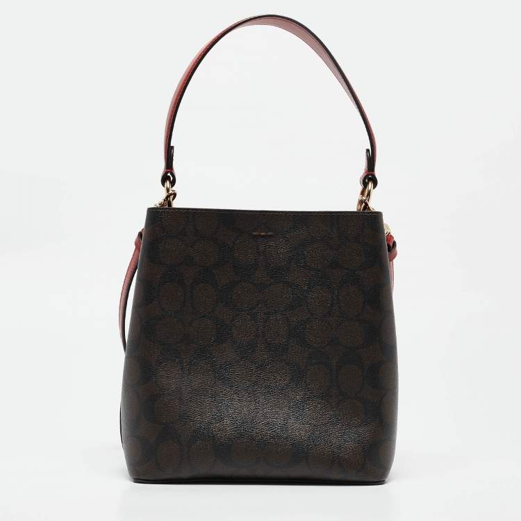 Pre Owned Coach Red/Brown Signature Coated Canvas and Leather Small Town Bucket Bag