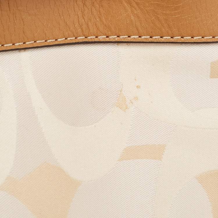 Pre Owned Coach Brown/Beige Op Art Signature Fabric and Leather Zoe Hobo