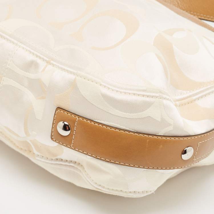 Pre Owned Coach Brown/Beige Op Art Signature Fabric and Leather Zoe Hobo