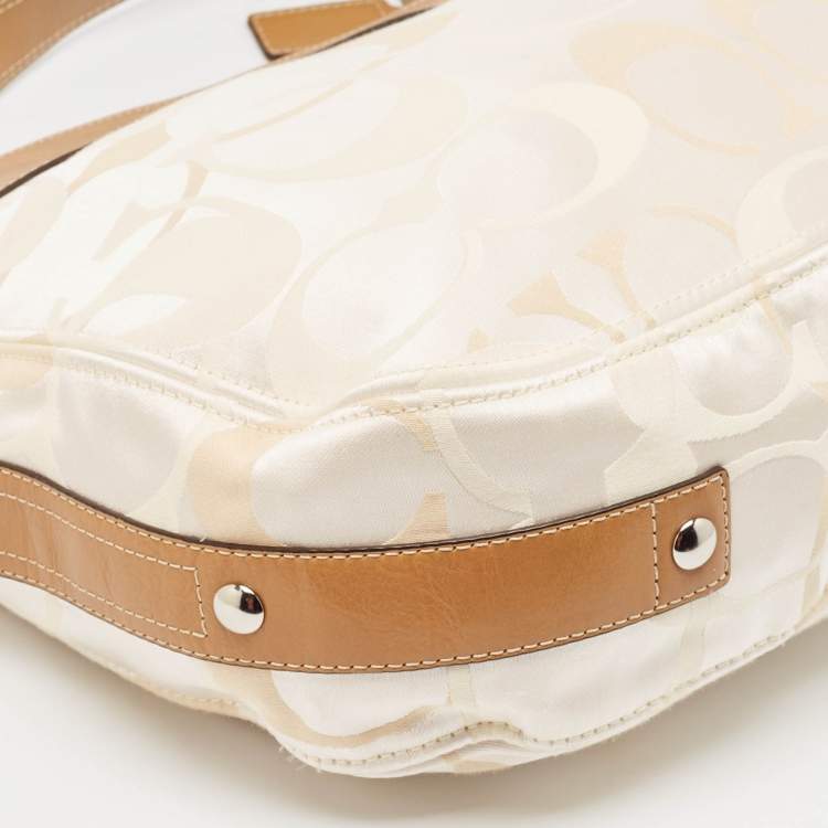Pre Owned Coach Brown/Beige Op Art Signature Fabric and Leather Zoe Hobo