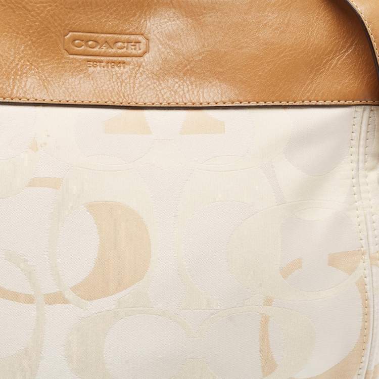 Pre Owned Coach Brown/Beige Op Art Signature Fabric and Leather Zoe Hobo