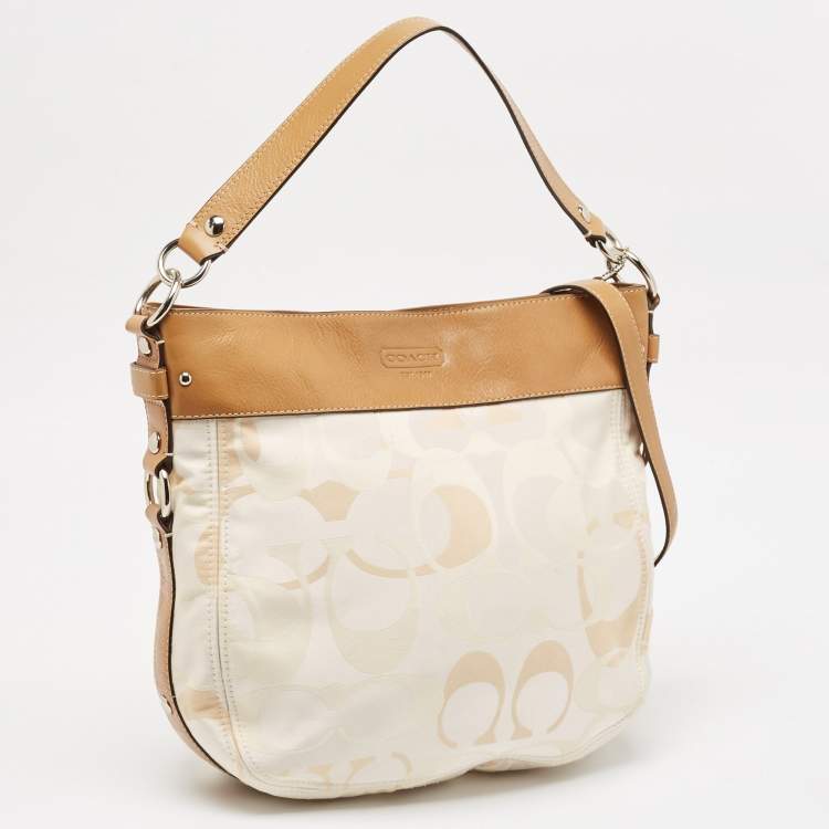 Pre Owned Coach Brown/Beige Op Art Signature Fabric and Leather Zoe Hobo