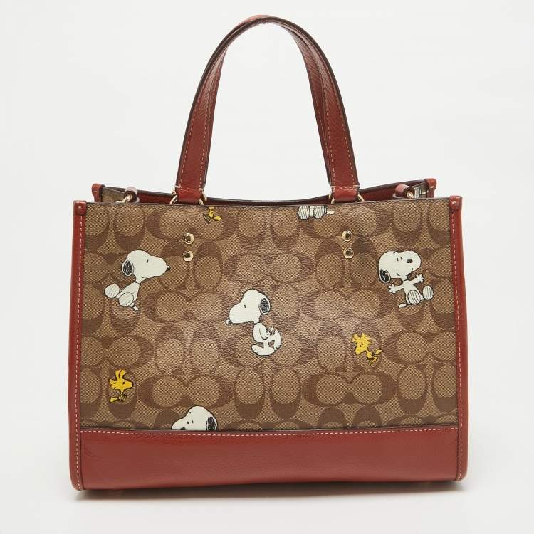 مملوكة مسبقًا Coach x Peanuts Khaki/Woody Red Snoopy Woodstock Print Coated Canvas Dempsey Carryall Bag