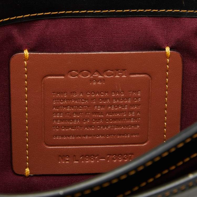 Pre Owned Coach Beige/Black Signature Coated Canvas and Leather Riley 22 Top Handle Bag