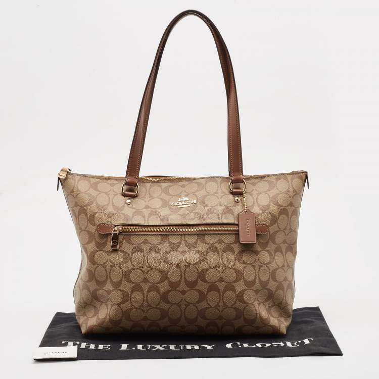 Pre Owned Coach Beige/Brown Signature Coated Canvas and Leather Gallery Tote