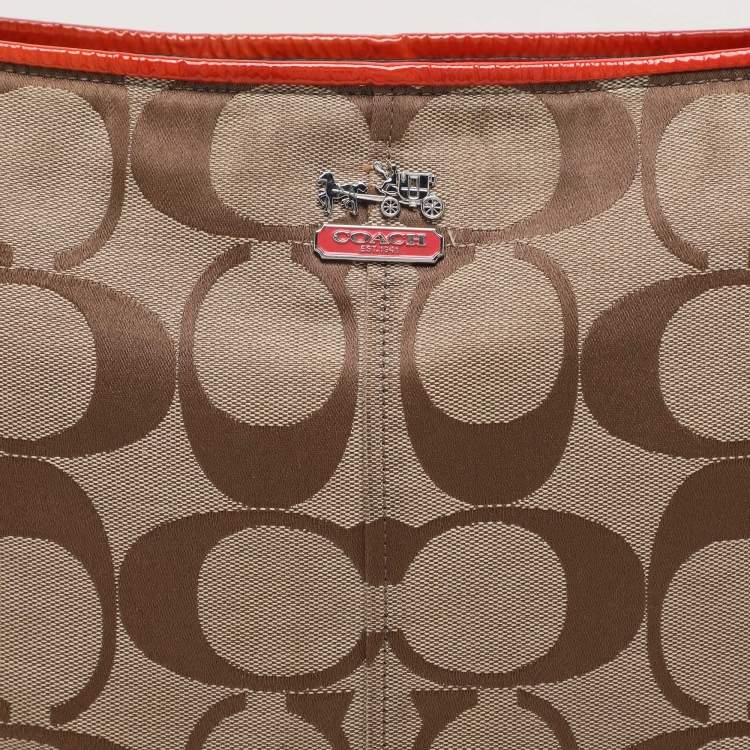 Pre Owned Coach Beige/Orange Signature Canvas and Patent Leather Katarina Hobo