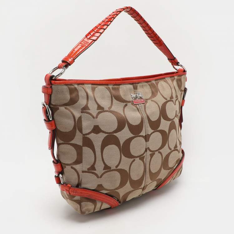 Pre Owned Coach Beige/Orange Signature Canvas and Patent Leather Katarina Hobo