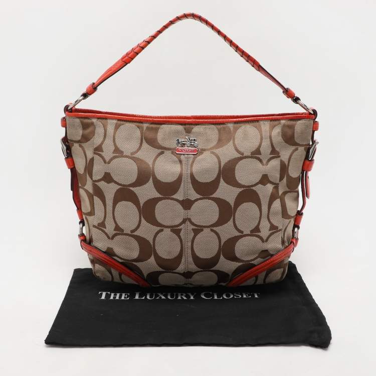 Pre Owned Coach Beige/Orange Signature Canvas and Patent Leather Katarina Hobo