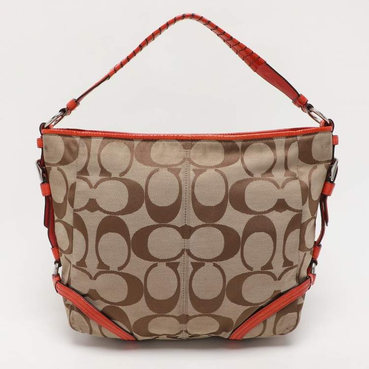 Pre Owned Coach Beige/Orange Signature Canvas and Patent Leather Katarina Hobo
