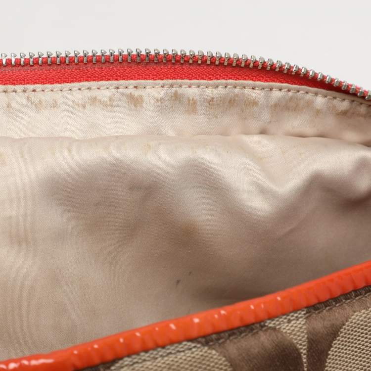 Pre Owned Coach Beige/Orange Signature Canvas and Patent Leather Katarina Hobo